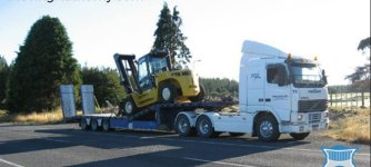 Forklift on trailer.JPG