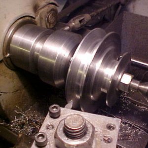 Turning a pulley with home made ER40 collet chuck and tool post.