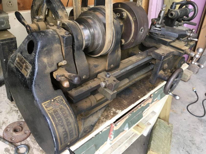 Early South Bend 9" lathe with overhead drive at garage sale